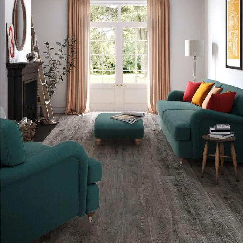 Gray wood-look laminate flooring with textured grain