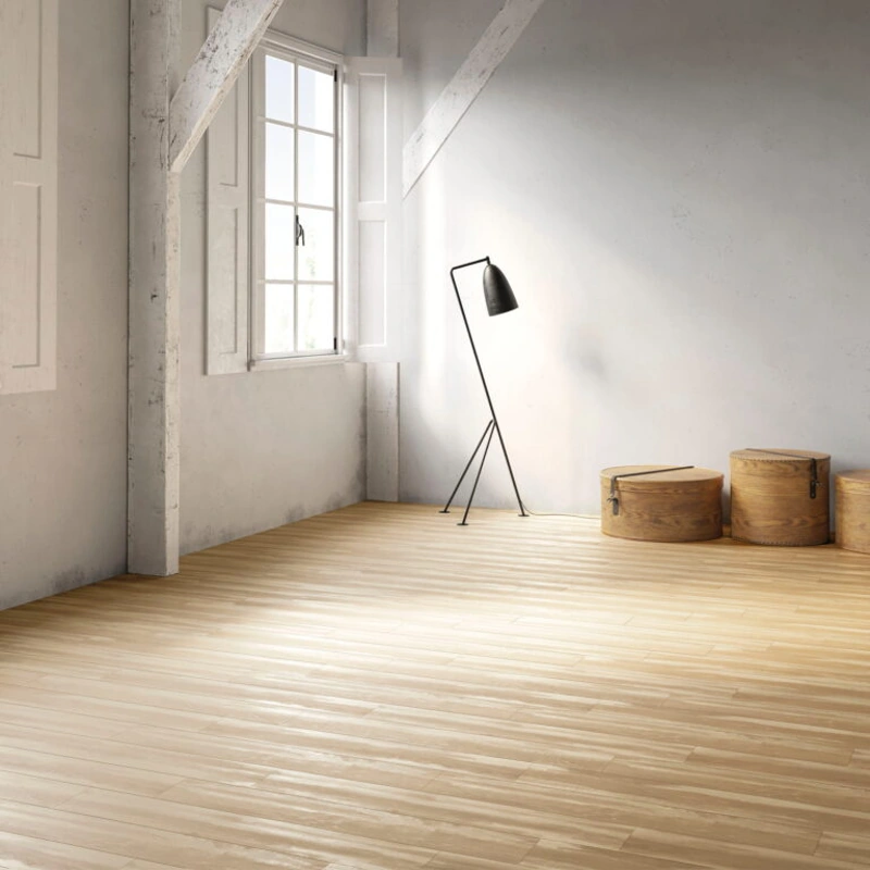 Light wood-look laminate flooring with subtle grain and matte finish.